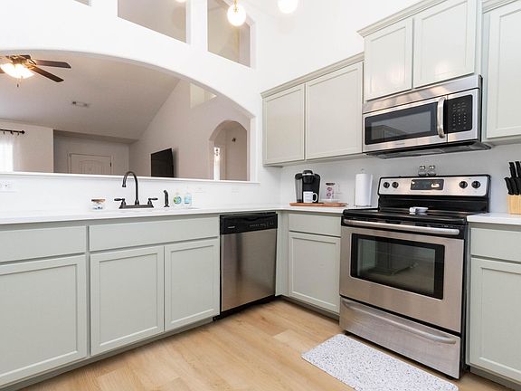 New quartz counters, new sink, new faucet, new light fixtures, SS appliances