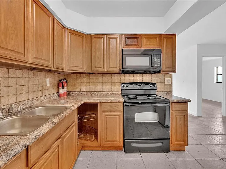 5748 NW 27th Ct — Photo 16