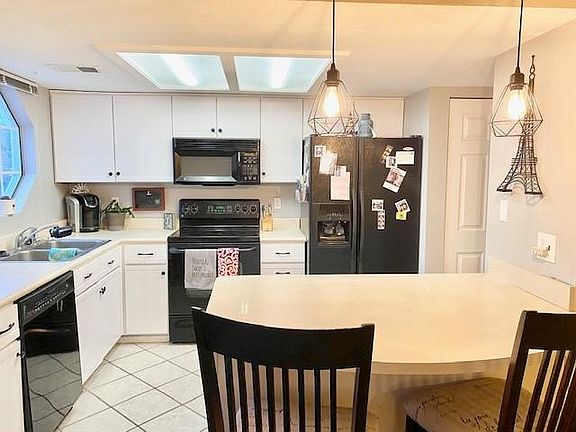 Kitchen has newly updated cabinets