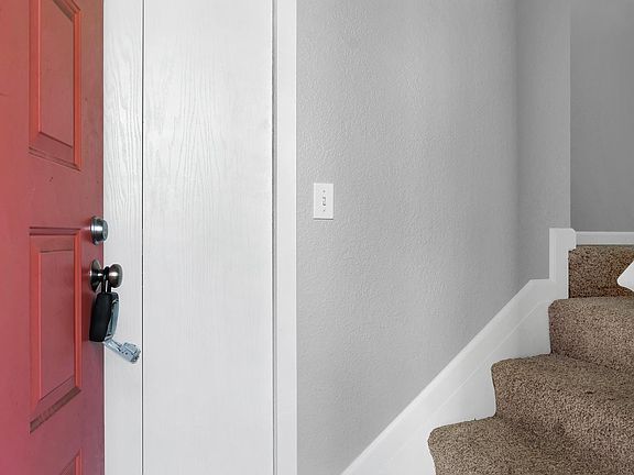 Front Entry + Coat Closet (private garage entrance to the left)