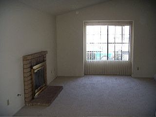 Living room looking from eating area in kitchen.