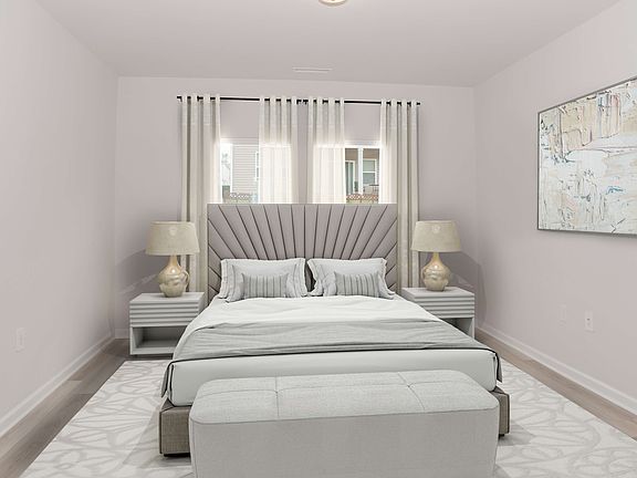 Your primary suite features a walk-in closet and a luxurious bath.