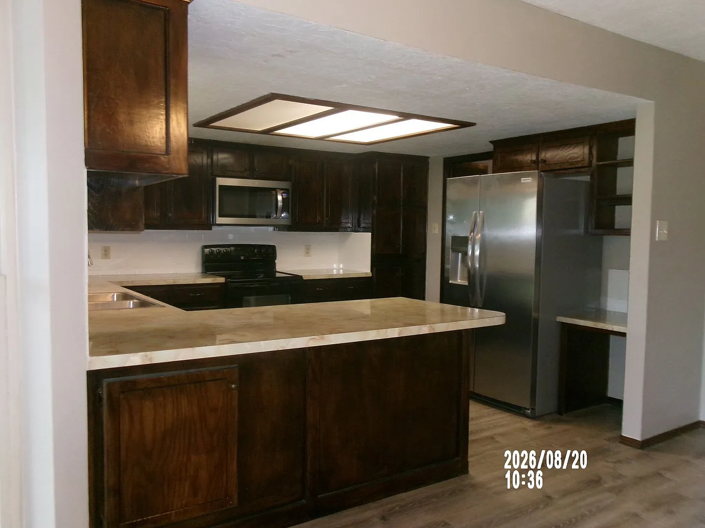 Beautifully Updated 3-Bedroom Home with Spacious Yard & Double Garage — Photo 4