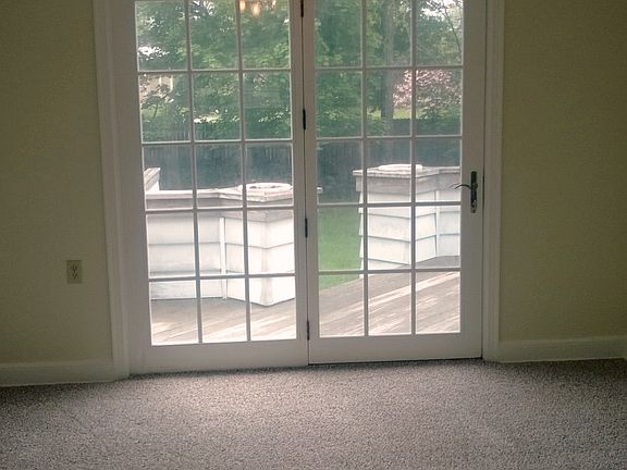 Dining room with access to deck and back yard.
