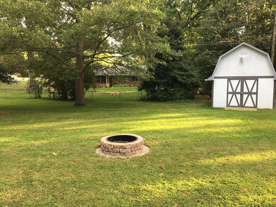 Backyard with firepit & barn