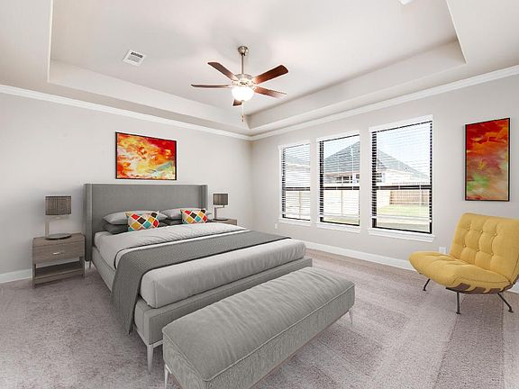 Primary bedroom with tray ceiling virtually staged for demonstration