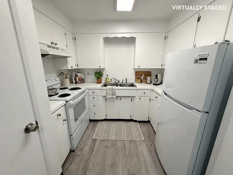 Cozy kitchen with ample storage space.