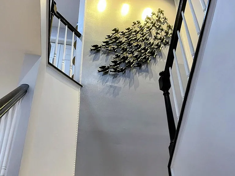 The upper level has a loft, two bedrooms and a full bathroom on one end and the master suite on the other.