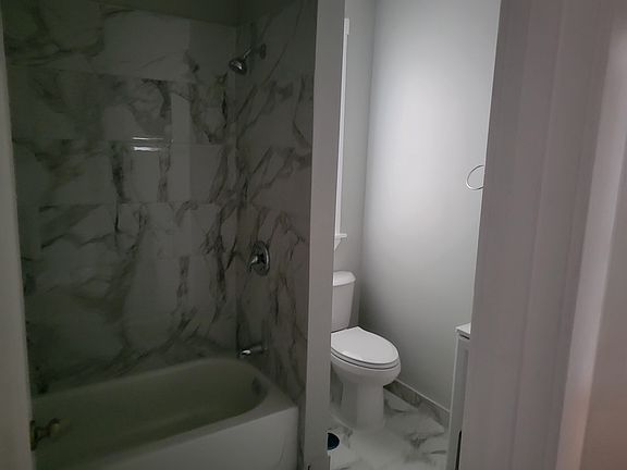 New bathroom with new tile and fixtures