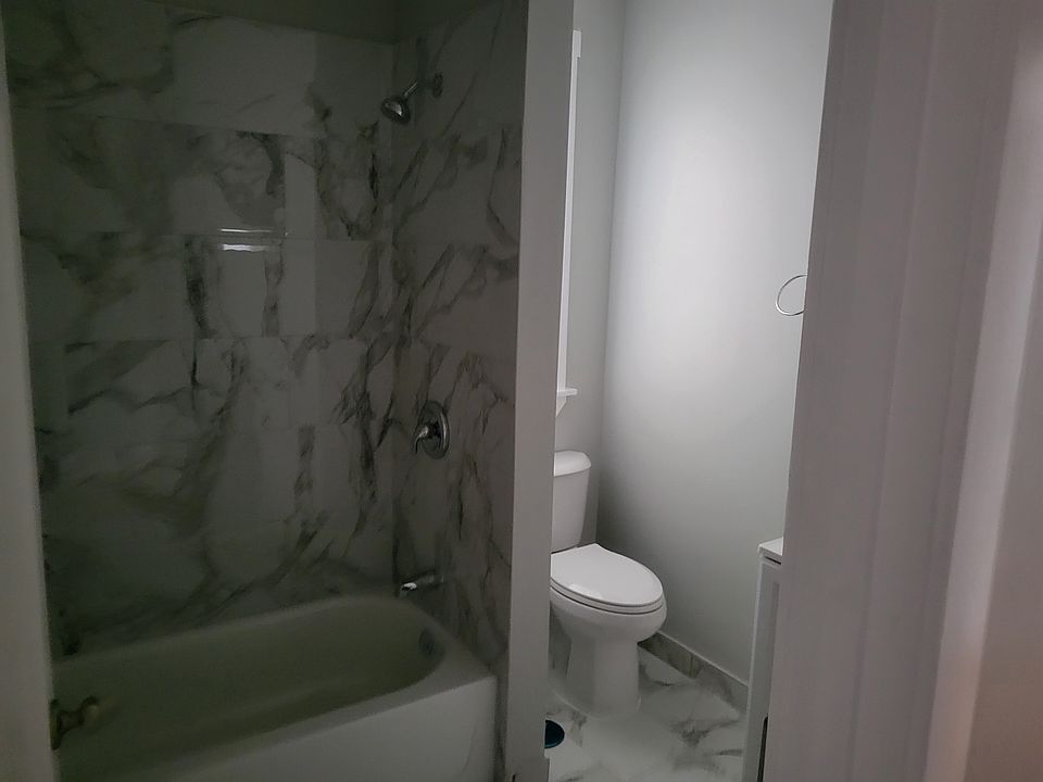 New bathroom with new tile and fixtures