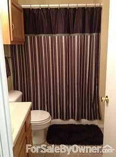 Hall Bathroom : full bath; includes laundry room