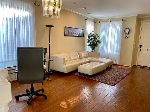 Comfortable sectional and wood floors