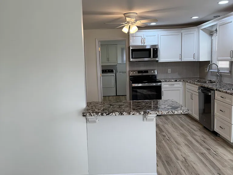 From living room looking in to kitchen