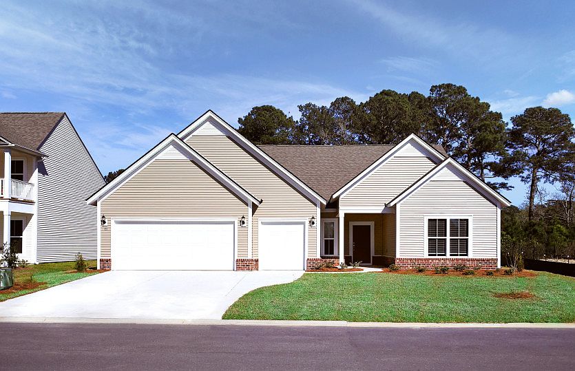 Dunwoody Way New Home Exterior LC2G with covered front door and golf cart bay.