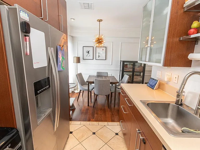 Galley kitchen looking at dining area