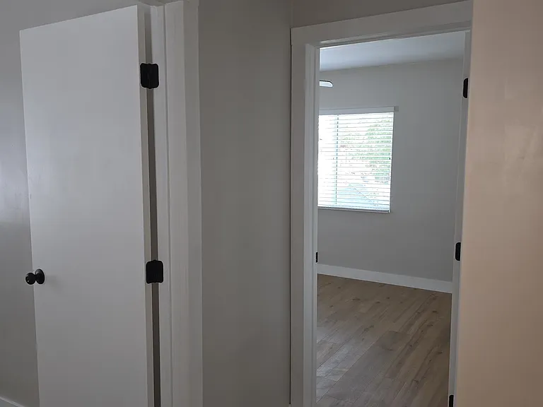 Hallway view into living room