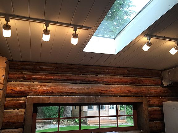 Solid, cozy, updated log home