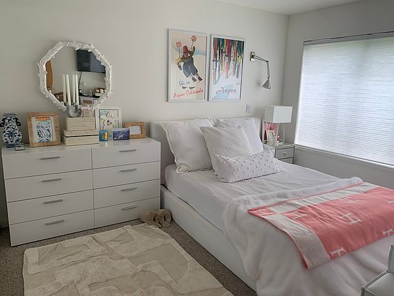 Opposite living area is room for bed and dresser.