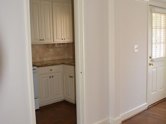 Picture taken from sunroom of kitchen and back entrance