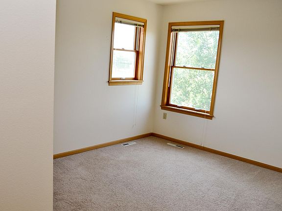 Guest bedroom with walk in closet.