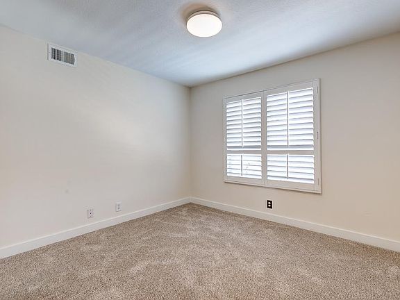 Second Bedroom. New Carpet!