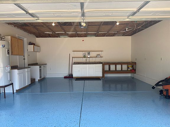 Epoxy floor + cabinet storage & workbench