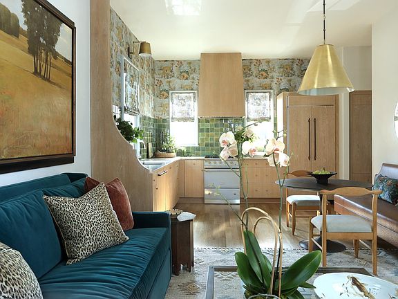 kitchen with LaCanche gas range and side by side paneled refrigerator