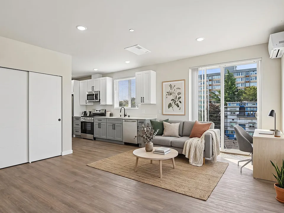 The whole home in one room, with a wide closet and a slider straight out to the balcony.