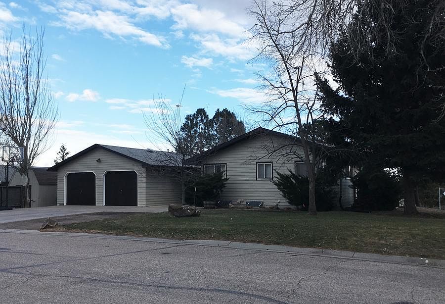 ~ West/Front Elevation
~ Driveway Parking