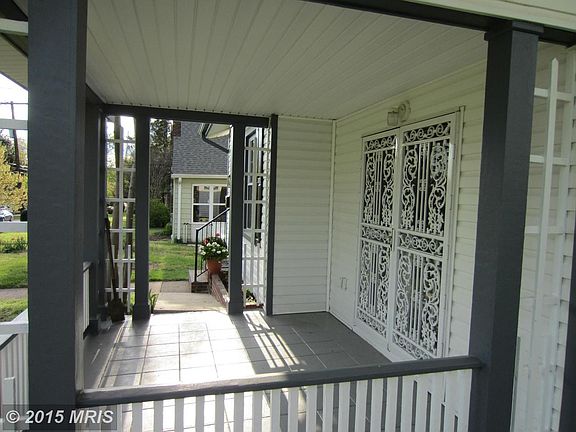 Front porch accessed by French doors from interior