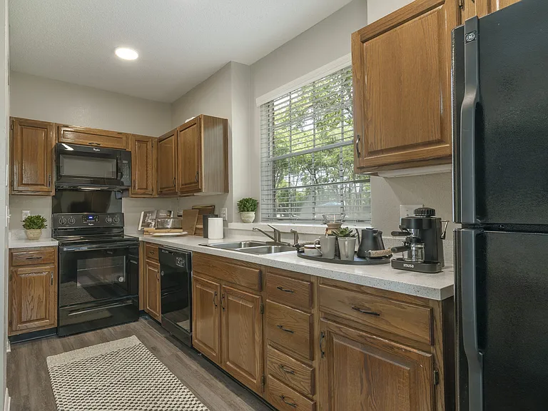 Spacious kitchen with solid-oak cabinetry and ample countertop space