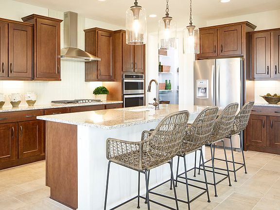 The Odyssey Kitchen Design Encourages Entertaining and Family Time