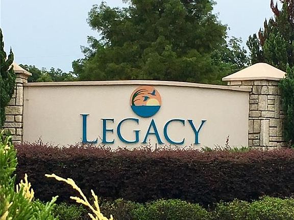 Welcome to Legacy!  The dramatic tree-lined entry, the ponds, playgrounds, trails, clubhouse, community pool, and  A-rated schools make Legacy a great place to call home.