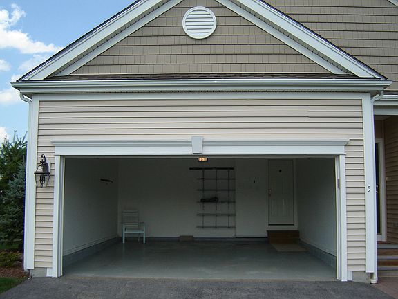 2-car garage w/ 2 driveway spaces too