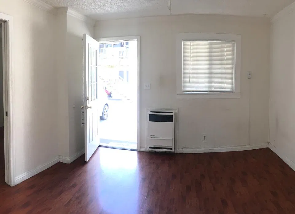 Inside of unit, living area with view of front door