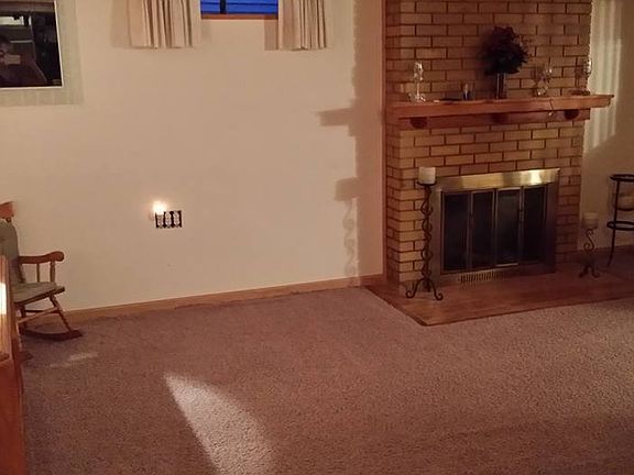 basement with gas fireplace
