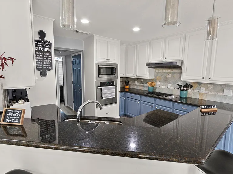 Enjoy your guests while preparing the meals over open space countertop