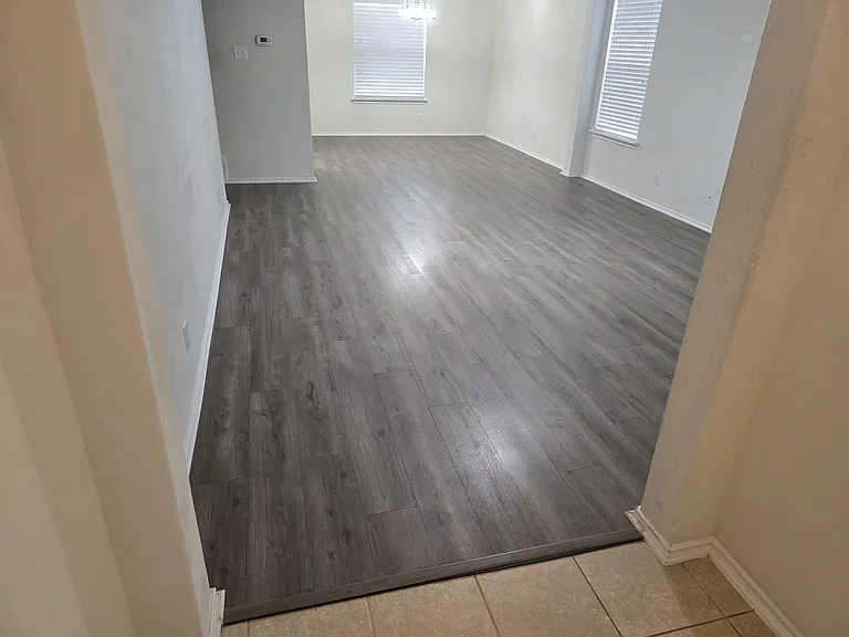 Updated living/dining area with wood floors