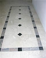 Marble flooring with inlays throughout the home