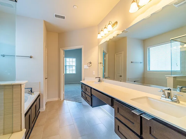 Dual sinks and makeup vanity