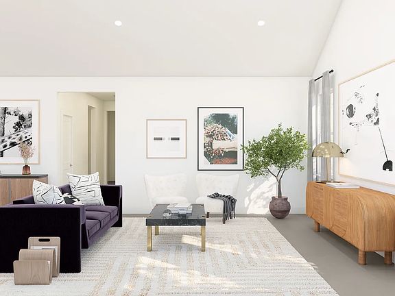 Great room with vaulted ceiling and low profile lighting