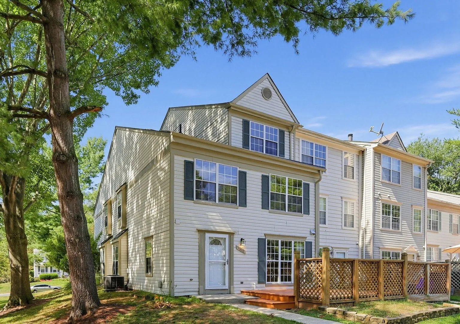 Bright End-Unit Home with Private Top-Floor Primary Suite — Photo 1