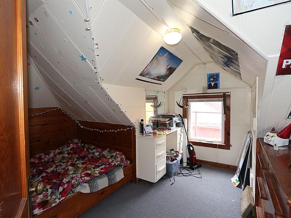 Built in Full sized bed, large dresser and desk in bedroom