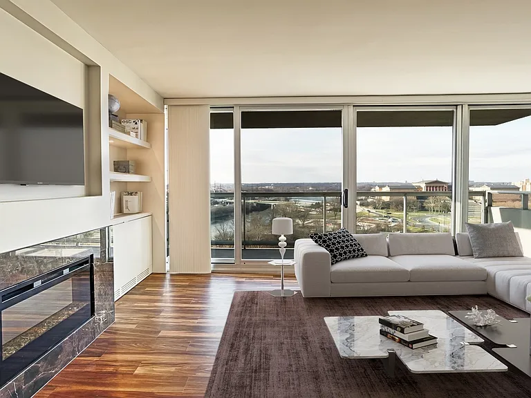 Wall-to-wall windows offer breathtaking penthouse views