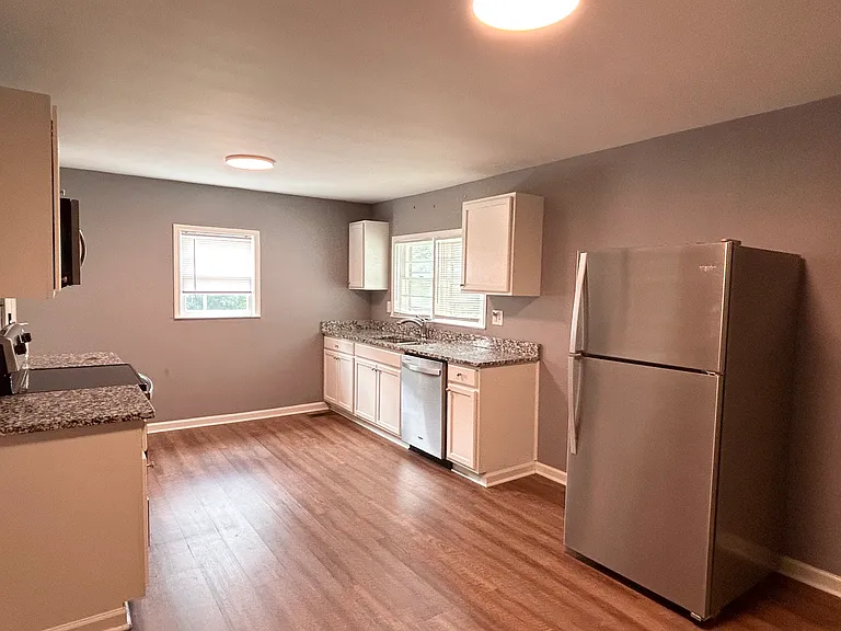 Kitchen area, nice hardwood floors