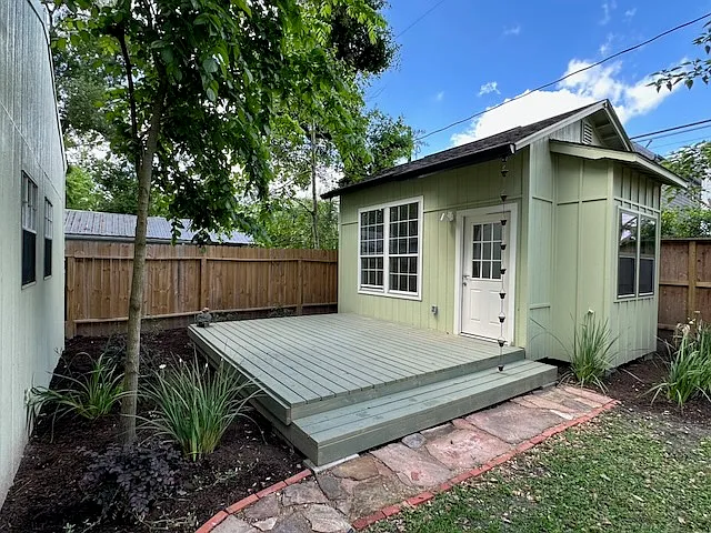 A stone path leads to the 212 sf Casita and its deck of almost the same size.