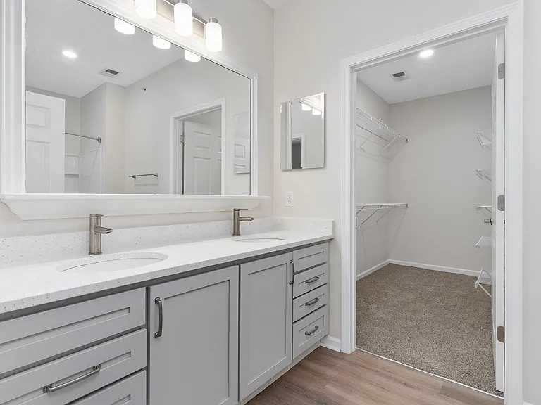 The Charleston Magnolia Premium Renovated Large Bathroom vanity with drawers, picture frame mirror, quartz countertop, brushed nickel fixtures
