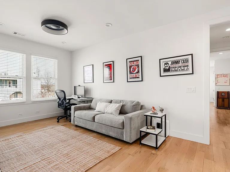 Second-floor flex room perfect for home office, playroom, or additional lounge area.