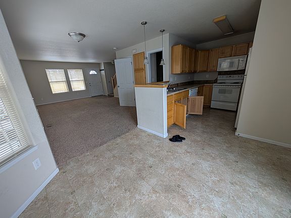 View of Kitchen & Living Room from the Breakfast Nook