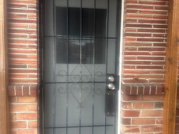 Unit door located at the backyard.